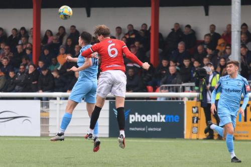 IMG 3041-Dean-Beckwith-heads-clear-fromn-Marcus-Wyllie