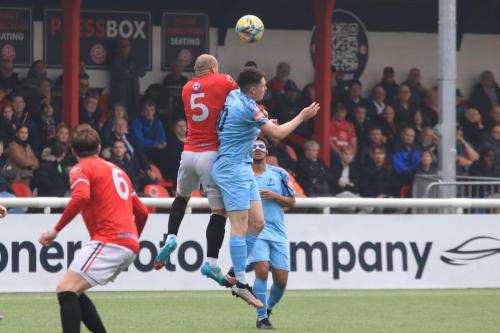 IMG 3092-Reece-Butler-heads-clear-from-Marcus-Wyllie