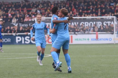 IMG 3129-Bernie-Tanner-2-celebrates-his-goal-with-Emmanuel-Harvest-and-Mickey-Parcell-L