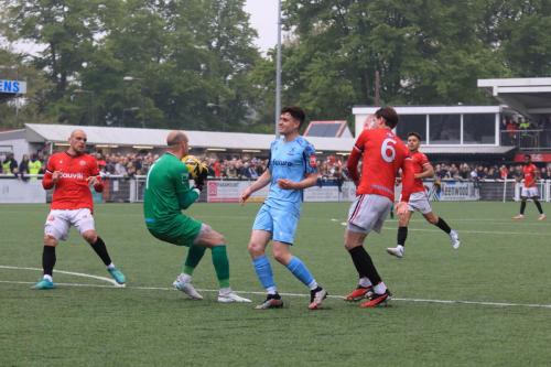 IMG 3147-Mitchell-Beeney-collects-the-ball-ahead-of-Marcus-Wyllie