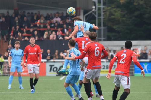 IMG 3186-Sam-Youngs-wins-the-ball-but-heads-straight-at-goalkeeper-Mitchell-Beeney