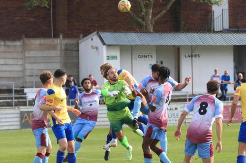 IMG 2070-Enfields-James-Richmond-challenges-Chesham-keeper-Zaki-Oualah