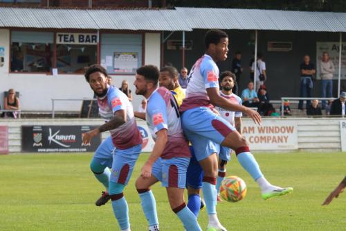 IMG 2087-Cheshams-Jordan-Edwards-L-Eoin-Casey-and-Avan-Jones-R-make-sure-the-ball-doesnt-reach-Kyle-Bailey