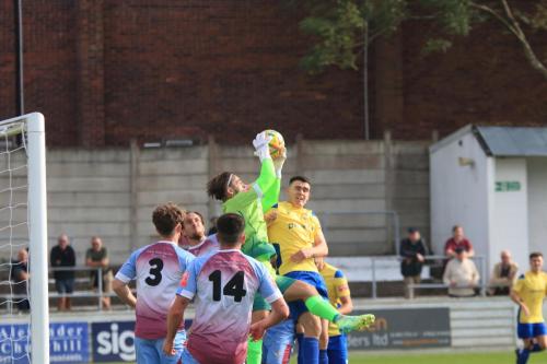 IMG 2091-Cheshams-Zaki-Oualah-reaches-a-cross-ahead-of-Marcus-Wyllie
