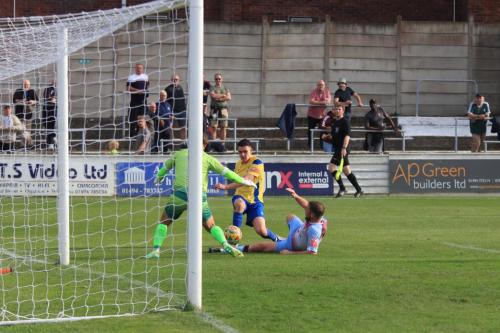 IMG 2154-Enfields-Marcus-Wyllie-challenged-by-Steve-Brwon-and-keeper-Zaki-Oualah