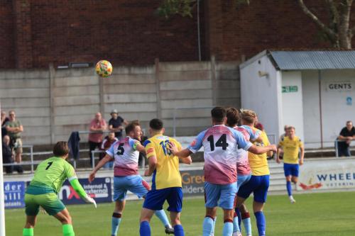 IMG 2161-Steve-Brown-5-heads-into-his-own-goal-but-is-reprieved-as-a-foul-is-awarded-elsewhere-in-the-box