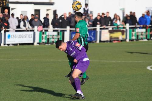 IMG 2561-Barney-Williams-wins-a-header-against-Marcus-Wyllie