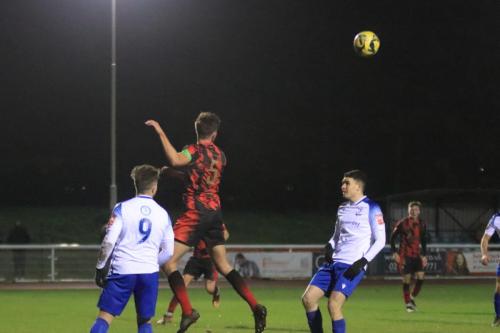 IMG 5775-Jake-Thompson-heads-clear-after-Marcus-Wyllies-penalty-rebounds-off-the-bar