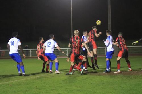 IMG 5814-Regents-Jake-Thompson-heads-clear-from-Louis-Birch