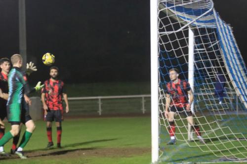 IMG 5844-Kyle-Baileys-header-rebounds-from-the-crossbar-straight-into-the-arms-of-Lewis-Greene