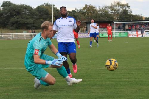 IMG 1906-Carshalton-keeper-Will-Huffer-collects-ahead-of-Reece-Beckles-Richards