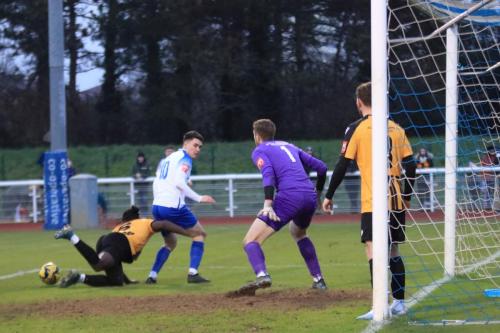 IMG 6716-Jason-Fregene-L-makes-sure-the-ball-doesnt-fall-for-Marcus-Wyllie