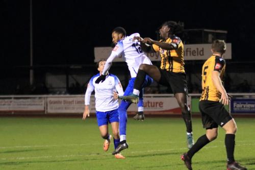 IMG 6833-Folkestones-Jason-Fregene-heads-clear-from-Jonathan-Hippolyte