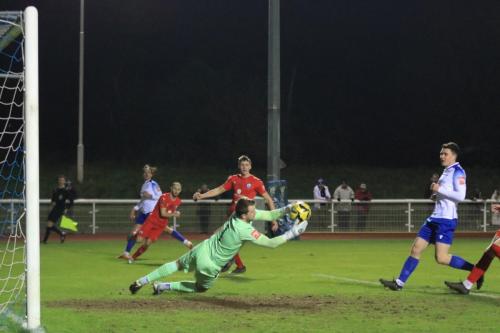 IMG 7803-Dan-Wilks-cuts-out-a-cross-from-Enfields-Sam-Youngs