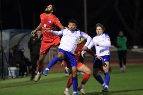IMG 7866-Frankie-Merrifield-L-wins-a-header-against-Dylan-Adjei-Hersey