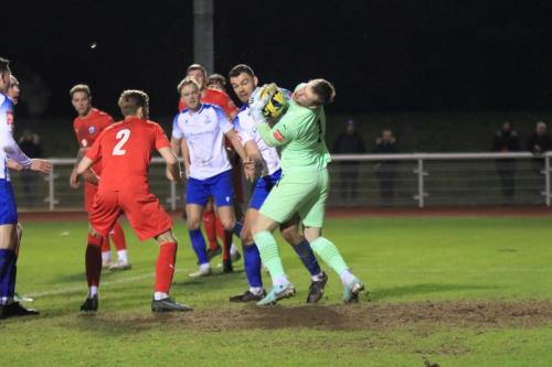 IMG 7970-Billericay-keeper-Dan-Wilks-comes-off-second-best-in-a-collision-with-Taylor-McKenzie-resulting-in-lengthy-treatment-and-a-change-of-jersey