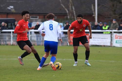 IMG 9420-Sam-Youngs-runs-at-Marcus-Sablier-L-and-Jake-Elliott