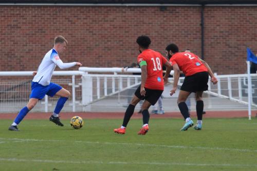 IMG 9457-Joe-Payne-runs-at-Bradley-Pritchard-and-Jake-Elliott-R