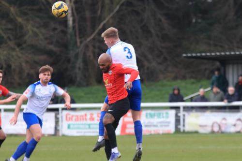 IMG 9569-Joe-Payne-3-wins-a-header-against-Ryan-Gondoh