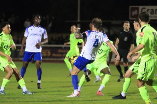 IMG 2792-Scott-Thomas-challenges-for-a-loose-ball