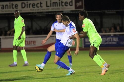 IMG 2798-Enfield-scorer-Taylor-McKenzie-challenged-by-Ben-Frempah