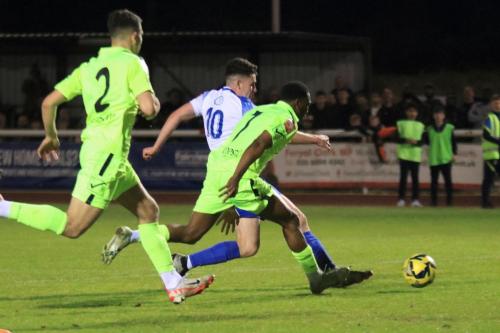 IMG 2808-Enfields-Marcus-Wyllie-tries-to-get-away-from-Alex-Solomon-L-and-Rhamar-Garrett-Douglas