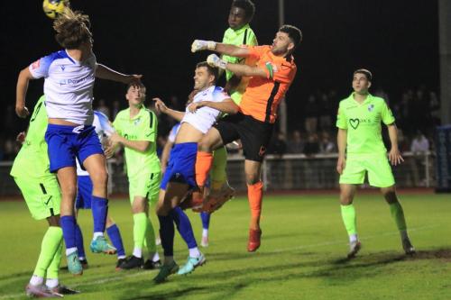 IMG 2830-Wingate-keeper-Ben-Goode-punches-clear