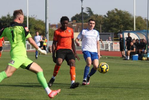 IMG 0966-Bognor-keeper-Ryan-Hall-clears-from-Marcus-Wyllie-R-and-Tobi-Ogundega