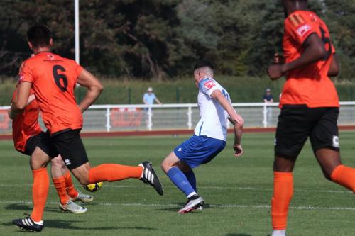 IMG 0990-Enfields-Marcus-Wyllie-challenged-by-Calvin-Davies