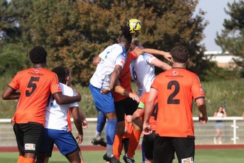 IMG 0996-Enfields-Joshua-Okotcha-and-James-Richmond-R-challenge-for-a-long-throw