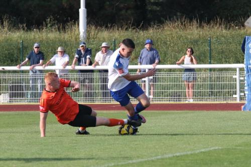 IMG 1177-Danny-Howick-may-have-been-lucky-not-to-concede-a-penalty-for-this-challenge-on-Marcus-Wyllie