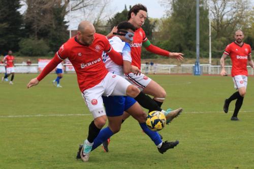 IMG 2622-Dylan-Adjei-Hersey-is-closed-down-by-Reece-Butler-L-and-Jack-Evans