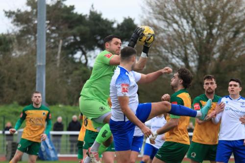 IMG 0045-Horsham-keeper-Lewis-Carey-collects-ahead-of-Taylor-McKenzie