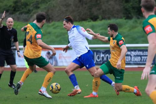 IMG 0191-Sam-Youngs-challenged-by-Jack-Brivio-L-and-Danny-Barker