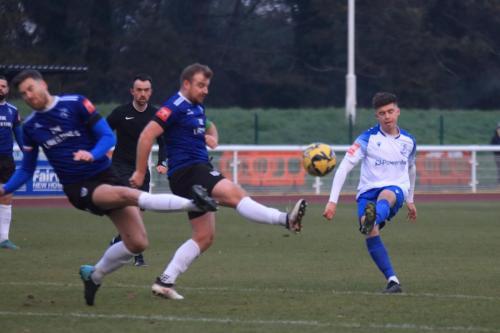 IMG 5358-Ollie-Knight-shoots-as-Lewis-Knight-L-and-Sam-Blackman-try-to-block