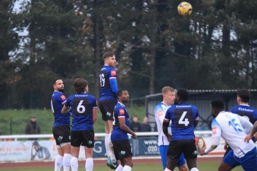 IMG 5417-Lewis-Knight-jumps-to-try-to-block-a-free-kick-which-flies-harmlessly-over-the-bar