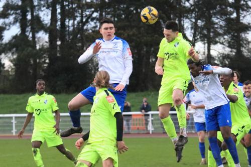 IMG 9080-Wingates-Billy-Cracknell-heads-clear-from-MArcus-Wyllie-and-Herson-Alves-R