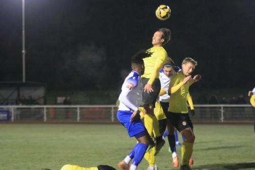 IMG 5185-Jona-Vega-Hansen-heads-clear-from-Joshua-Okotcha