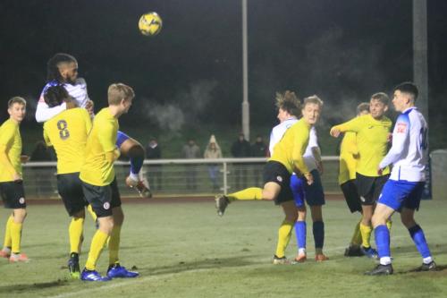 IMG 5271-Enfields-Joshua-Okotcha-wins-a-header-with-the-help-of-a-neck-lock-on-Jona-Vega-Hansen