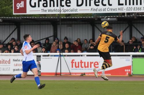 IMG 1055-Darion-Furlong-heads-clear-from-Marcus-Wyllie