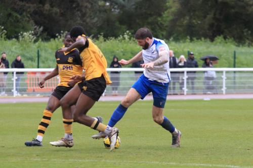 IMG 1226-Jake-Cass-turns-away-from-Samuel-Kuffour