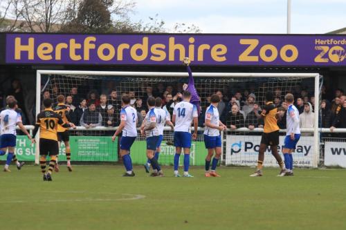 IMG 1286-Enfield-keeper-Rhys-Forster-has-the-ball-covered-as-it-clears-the-bar