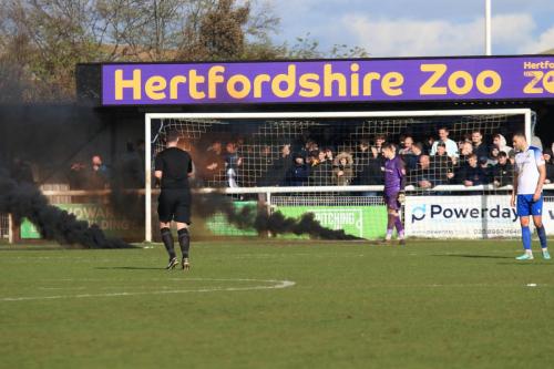 IMG 1381-The-game-was-briefly-delayed-by-smoke-bombs-from-the-Cheshunt-end