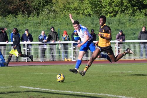IMG 1393-Marcus-Wyllie-L-shoots-past-the-challenge-of-Samuel-Kuffour