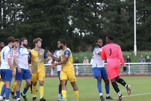 IMG 0013-Players-from-both-teams-intervene-to-calm-a-brief-scuffle-between-Sam-Youngs-far-L-and-Lamar-Johnson-far-R-who-were-both-cautioned