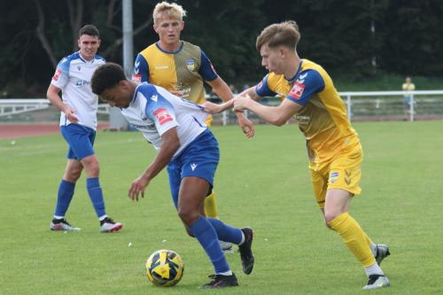 IMG 0051-Max-Hudson-R-tries-to-hold-back-Dylan-Adjei-Hersey