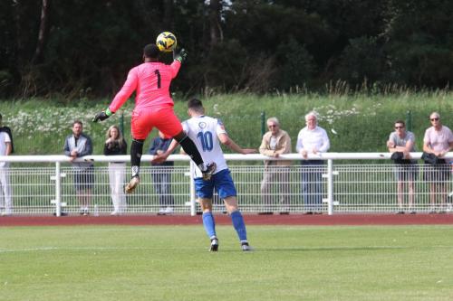 IMG 9973-Concord-keeper-Lamar-Johnson-punches-clear-and-also-kicks-Marcus-Wyllie-in-the-small-of-the-back