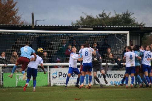 IMG 4180-Enfields-Joshua-Okotcha-heads-clear-from-Tommy-Penfold