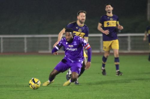 IMG 0473-Jake-Cass-tries-to-put-Ryley-Allen-off-his-clearance-kick