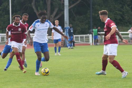 IMG 0868-Gucci-Souly-Osekanongo-breaks-clear-of-Samuel-Dowridge-as-Ryan-Hervel-covers